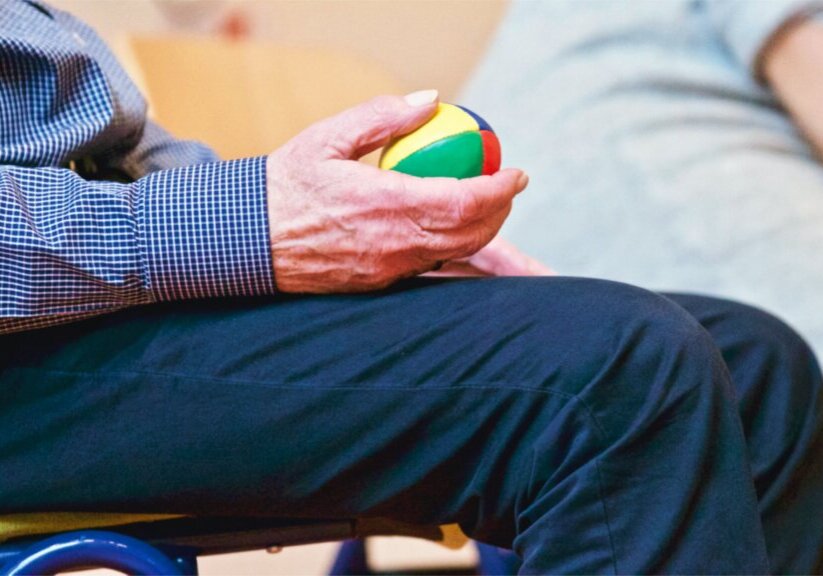 Person holding a ball