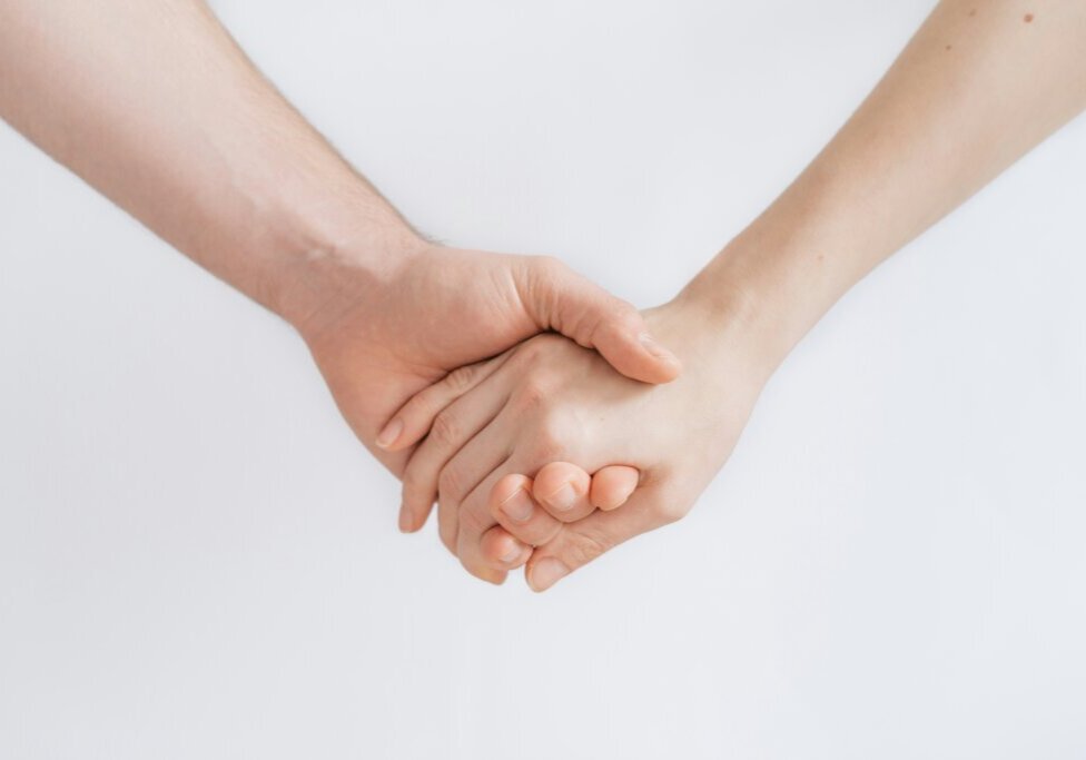 Person holding another persons hand